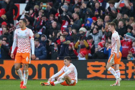 Photo for Albie Morgan of Blackpool reacts to his side conceding a goal to make it 2-2 during the Emirates FA Cup Third Round match Nottingham Forest vs Blackpool at City Ground, Nottingham, United Kingdom, 7th January 202 - Royalty Free Image