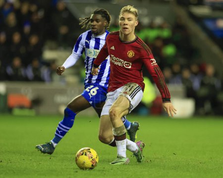 Photo for Rasmus Hojlund of Manchester United passes the ball during the Emirates FA Cup Third Round match Wigan Athletic vs Manchester United at DW Stadium, Wigan, United Kingdom, 8th January 2024 - Royalty Free Image