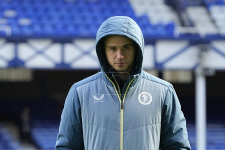 Photo for Leander Dendoncker of Aston Villa inspects the pitch before the Premier League match Everton vs Aston Villa at Goodison Park, Liverpool, United Kingdom, 14th January 2024 - Royalty Free Image