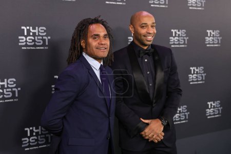 Photo for Former France International Christian Karembeu (L) and Former France International Thierry Henry arrives on the Green Carpet ahead of The Best FIFA Football Awards 2023 at Apollo Theatre, London, United Kingdom, 15th January 2024 - Royalty Free Image