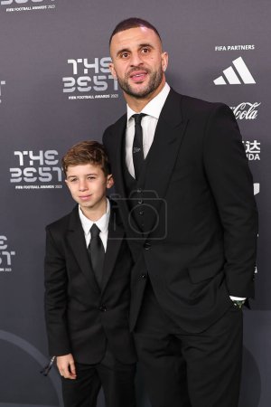 Photo for Kyle Walker and guest arrives on the Green Carpet ahead of The Best FIFA Football Awards 2023 at Apollo Theatre, London, United Kingdom, 15th January 2024 - Royalty Free Image