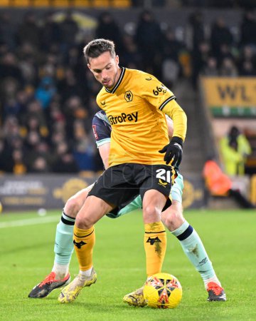 Photo for Pablo Sarabia of Wolverhampton Wanderers holds the ball up, during the Emirates FA Cup Third Round Replay match Wolverhampton Wanderers vs Brentford at Molineux, Wolverhampton, United Kingdom, 16th January 2024 - Royalty Free Image