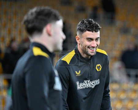 Photo for Max Kilman of Wolverhampton Wanderers all smiles as he warms up ahead of the match, during the Emirates FA Cup Third Round Replay match Wolverhampton Wanderers vs Brentford at Molineux, Wolverhampton, United Kingdom, 16th January 2024 - Royalty Free Image