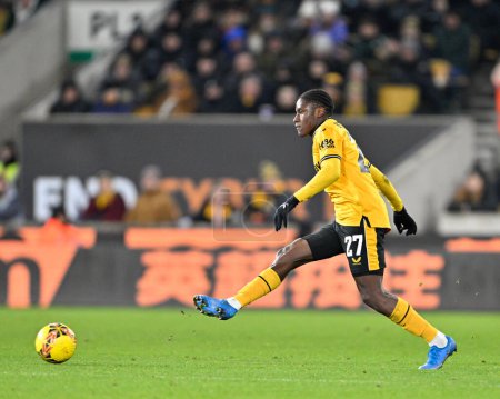 Photo for Jean-Ricner Bellegarde of Wolverhampton Wanderers passes the ball, during the Emirates FA Cup Third Round Replay match Wolverhampton Wanderers vs Brentford at Molineux, Wolverhampton, United Kingdom, 16th January 2024 - Royalty Free Image