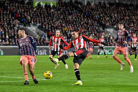 Photo for Sergio Reguiln of Brentford shoots on goal during the Premier League match Brentford vs Nottingham Forest at The Gtech Community Stadium, London, United Kingdom, 20th January 2024 - Royalty Free Image