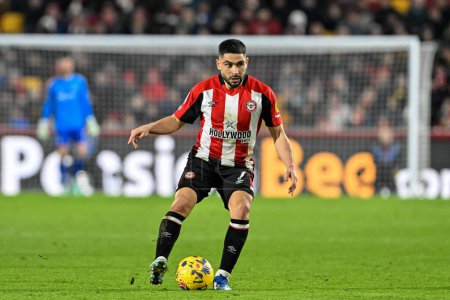 Photo for Neal Maupay of Brentford with the ball during the Premier League match Brentford vs Nottingham Forest at The Gtech Community Stadium, London, United Kingdom, 20th January 202 - Royalty Free Image