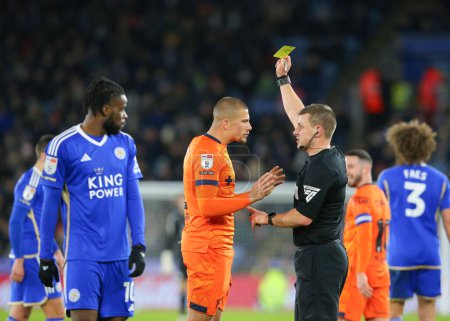 Photo for Referee Josh Smith gives Harry Clarke of Ipswich Town his first yellow card of the match, during the Sky Bet Championship match Leicester City vs Ipswich Town at King Power Stadium, Leicester, United Kingdom, 22nd January 202 - Royalty Free Image