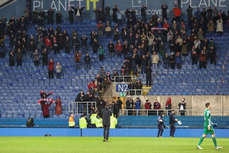 Photo for Neill Collins Head coach of Barnsley applauds the travelling fans after the Barnsley win 0-1 during the Sky Bet League 1 match Oxford United vs Barnsley at Kassam Stadium, Oxford, United Kingdom, 23rd January 202 - Royalty Free Image