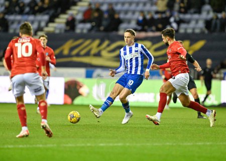 Photo for Thelo Aasgaard of Wigan Athletic passes the ball, during the Sky Bet League 1 match Wigan Athletic vs Wycombe Wanderers at DW Stadium, Wigan, United Kingdom, 23rd January 202 - Royalty Free Image