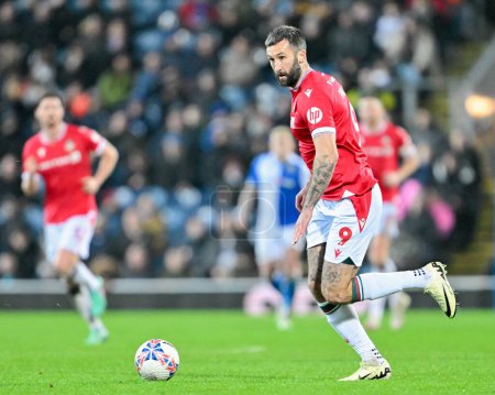 Photo for Ollie Palmer of Wrexham breaks forward with the ball, during the Emirates FA Cup Fourth Round match Blackburn Rovers vs Wrexham at Ewood Park, Blackburn, United Kingdom, 29th January 202 - Royalty Free Image