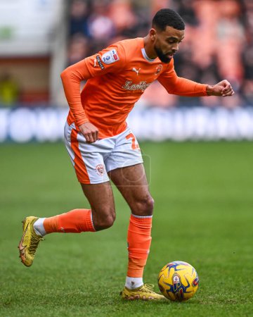 Photo for CJ Hamilton of Blackpool makes a break with the ball during the Sky Bet League 1 match Blackpool vs Charlton Athletic at Bloomfield Road, Blackpool, United Kingdom, 27th January 202 - Royalty Free Image