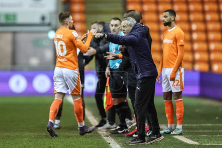 Photo for Neil Critchley head coach of Blackpool gives his team instructions  during a break in play during the Bristol Street Motors Trophy Quarter Final match Blackpool vs Bolton Wanderers at Bloomfield Road, Blackpool, United Kingdom, 30th January 202 - Royalty Free Image