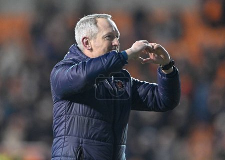 Photo for Neil Critchley Head Coach of Blackpool celebrates the full time result, during the Bristol Street Motors Trophy Quarter Final match Blackpool vs Bolton Wanderers at Bloomfield Road, Blackpool, United Kingdom, 30th January 202 - Royalty Free Image
