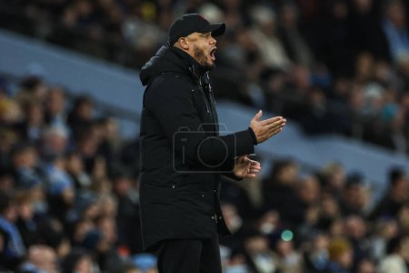 Photo for Vincent Kompany manager of Burnley gives his players instructions during the Premier League match Manchester City vs Burnley at Etihad Stadium, Manchester, United Kingdom, 31st January 2024 - Royalty Free Image