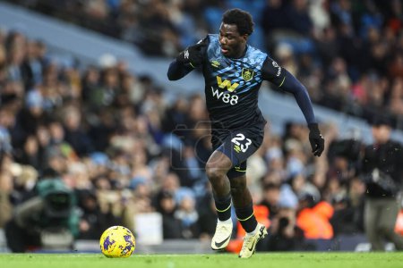 Photo for Datro Fofana of Burnley breaks with the ball during the Premier League match Manchester City vs Burnley at Etihad Stadium, Manchester, United Kingdom, 31st January 202 - Royalty Free Image