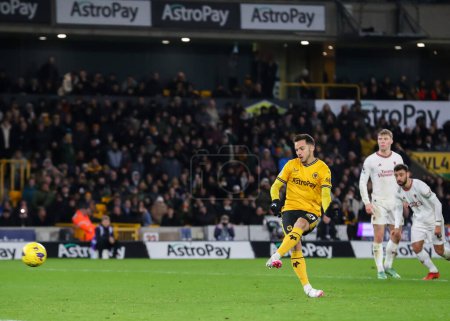 Photo for Pablo Sarabia of Wolverhampton Wanderers strikes the Wolves penalty to make it 1-2, during the Premier League match Wolverhampton Wanderers vs Manchester United at Molineux, Wolverhampton, United Kingdom, 1st February 202 - Royalty Free Image