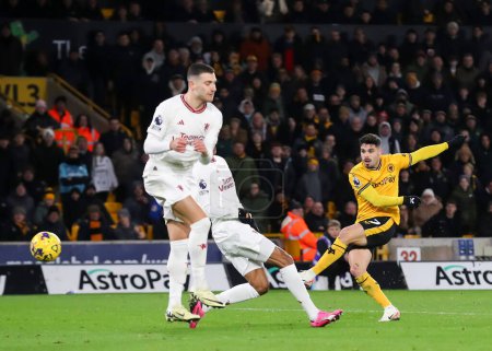 Photo for Pedro Neto of Wolverhampton Wanderers strikes the ball to make it 3-3, during the Premier League match Wolverhampton Wanderers vs Manchester United at Molineux, Wolverhampton, United Kingdom, 1st February 202 - Royalty Free Image