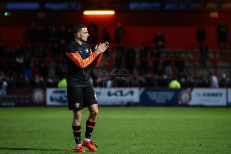 Photo for Oliver Norburn of Blackpool applauds the travelling fans after the Sky Bet League 1 match Stevenage vs Blackpool at Lamex Stadium, Stevenage, United Kingdom, 3rd February 202 - Royalty Free Image