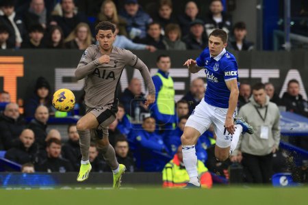 Photo for Brennan Johnson of Tottenham Hotspur and Vitaly Mykolenko of Everton chase for the ball during the Premier League match Everton vs Tottenham Hotspur at Goodison Park, Liverpool, United Kingdom, 3rd February 202 - Royalty Free Image