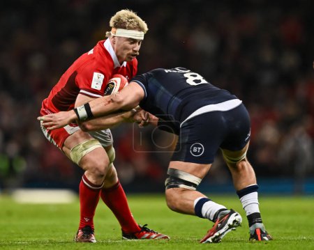 Photo for Aaron Wainwright of Wales is tackled by Matt Fagerson of Scotland during the 2024 Guinness 6 Nations match Wales vs Scotland at Principality Stadium, Cardiff, United Kingdom, 3rd February 202 - Royalty Free Image