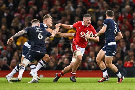 Photo for Alex Mann of Wales fends off Duhan van der Merwe of Scotland during the 2024 Guinness 6 Nations match Wales vs Scotland at Principality Stadium, Cardiff, United Kingdom, 3rd February 202 - Royalty Free Image