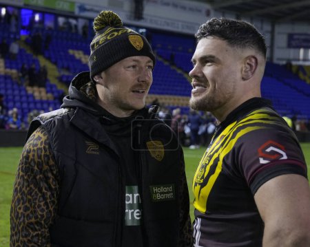 Photo for Joe Philbin of Warrington Wolves speak with Josh Charnley of Leigh Leopards after the Rugby League Joe Philbin Testimonial match Warrington Wolves vs Leigh Leopards at Halliwell Jones Stadium, Warrington, United Kingdom, 3rd February 202 - Royalty Free Image