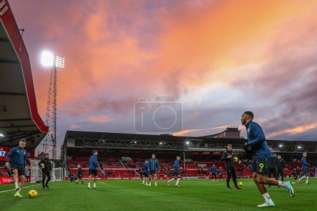 Photo for Newcastle United players during the pre-game warm up ahead of the Premier League match Nottingham Forest vs Newcastle United at City Ground, Nottingham, United Kingdom, 10th February 202 - Royalty Free Image