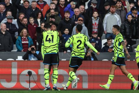 Photo for Gabriel of Arsenal celebrates his goal to make it 0-3 during the Premier League match West Ham United vs Arsenal at London Stadium, London, United Kingdom, 11th February 202 - Royalty Free Image