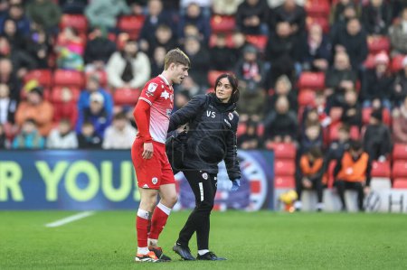 Photo for Luca Connell of Barnsley receives treatment during the Sky Bet League 1 match Barnsley vs Leyton Orient at Oakwell, Barnsley, United Kingdom, 10th February 202 - Royalty Free Image