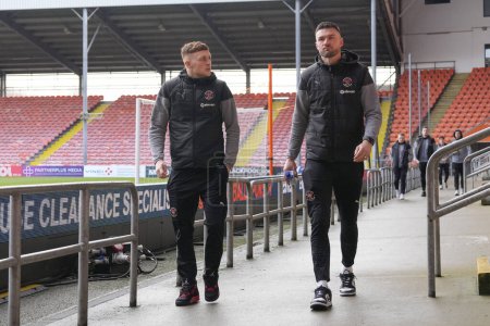 Photo for Oliver Casey of Blackpool and Richard O'Donnell of Blackpool arrives at the stadium before the Sky Bet League 1 match Blackpool vs Oxford United at Bloomfield Road, Blackpool, United Kingdom, 10th February 202 - Royalty Free Image