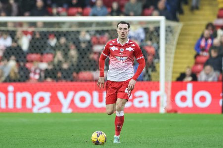 Photo for Josh Earl of Barnsley breaks with the ball during the Sky Bet League 1 match Barnsley vs Leyton Orient at Oakwell, Barnsley, United Kingdom, 10th February 202 - Royalty Free Image