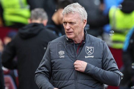 Photo for David Moyes manager of West Ham United come out for the game during the Premier League match West Ham United vs Arsenal at London Stadium, London, United Kingdom, 11th February 202 - Royalty Free Image