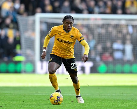 Photo for Jean-Ricner Bellegarde of Wolverhampton Wanderers in action, during the Premier League match Wolverhampton Wanderers vs Brentford at Molineux, Wolverhampton, United Kingdom, 10th February 202 - Royalty Free Image