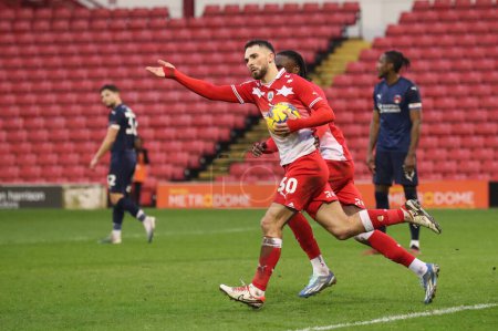 Photo for Adam Phillips of Barnsley celebrates his goal to make it 1-1 during the Sky Bet League 1 match Barnsley vs Leyton Orient at Oakwell, Barnsley, United Kingdom, 10th February 202 - Royalty Free Image