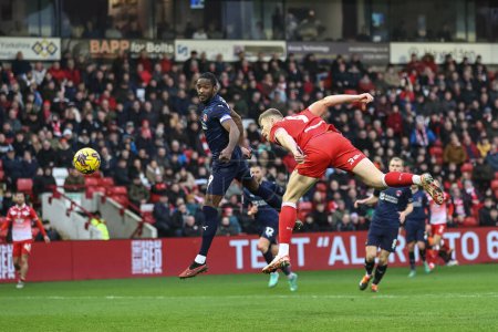 Photo for Sam Cosgrove of Barnsley heads on goal during the Sky Bet League 1 match Barnsley vs Leyton Orient at Oakwell, Barnsley, United Kingdom, 10th February 202 - Royalty Free Image