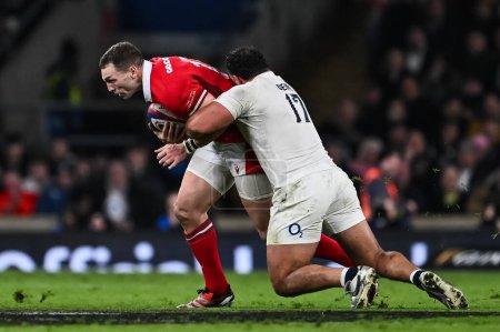 Photo for George North of Wales is tackled by Ellis Genge of England during the 2024 Guinness 6 Nations match England vs Wales at Twickenham Stadium, Twickenham, United Kingdom, 10th February 202 - Royalty Free Image