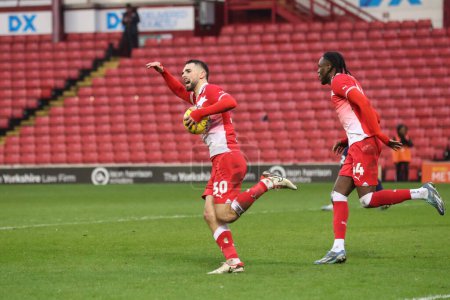 Photo for Adam Phillips of Barnsley celebrates his goal to make it 1-1 during the Sky Bet League 1 match Barnsley vs Leyton Orient at Oakwell, Barnsley, United Kingdom, 10th February 202 - Royalty Free Image