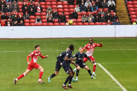 Photo for Devante Cole of Barnsley and Mal de Gevigney of Barnsley in action during the Sky Bet League 1 match Barnsley vs Leyton Orient at Oakwell, Barnsley, United Kingdom, 10th February 2024 - Royalty Free Image