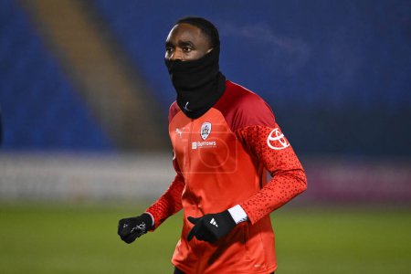 Photo for Devante Cole of Barnsley during the pre-game warmup ahead of the Sky Bet League 1 match Shrewsbury Town vs Barnsley at Croud Meadow, Shrewsbury, United Kingdom, 13th February 202 - Royalty Free Image