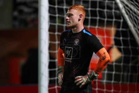 Photo for Mackenzie Chapman of Blackpool during the pre-game warm up ahead of the Sky Bet League 1 match Cheltenham Town vs Blackpool at The Completely-Suzuki Stadium, Cheltenham, United Kingdom, 13th February 202 - Royalty Free Image