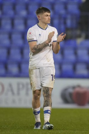 Photo for Harvey Saunders of Tranmere Rovers salutes the fans after the Sky Bet League 2 match Tranmere Rovers vs Morecambe at Prenton Park, Birkenhead, United Kingdom, 13th February 202 - Royalty Free Image
