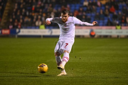 Photo for Nicky Cadden of Barnsley crosses the ball during the Sky Bet League 1 match Shrewsbury Town vs Barnsley at Croud Meadow, Shrewsbury, United Kingdom, 13th February 202 - Royalty Free Image