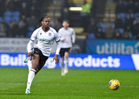 Photo for Paris Maghoma of Bolton Wanderers breaks forward with the ball, during the Sky Bet League 1 match Bolton Wanderers vs Wycombe Wanderers at Toughsheet Community Stadium, Bolton, United Kingdom, 13th February 202 - Royalty Free Image