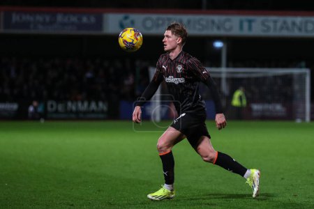 Photo for George Byers of Blackpool in action during the Sky Bet League 1 match Cheltenham Town vs Blackpool at The Completely-Suzuki Stadium, Cheltenham, United Kingdom, 13th February 202 - Royalty Free Image
