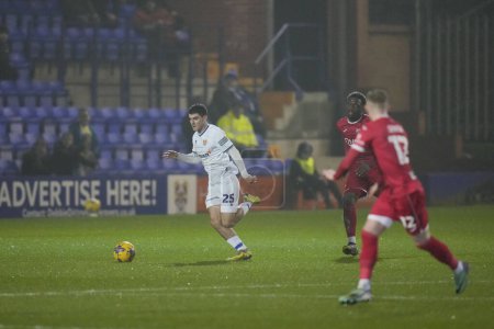 Photo for Rob Apter of Tranmere Rovers makes a break during the Sky Bet League 2 match Tranmere Rovers vs Morecambe at Prenton Park, Birkenhead, United Kingdom, 13th February 202 - Royalty Free Image