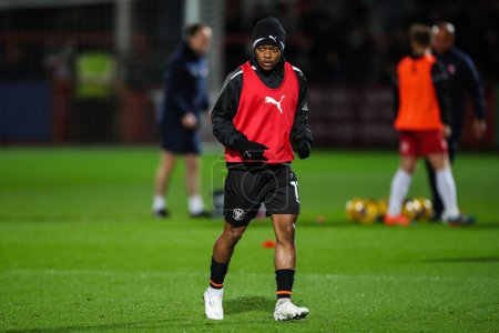 Photo for Karamoko Dembele of Blackpool during the pre-game warm up ahead of the Sky Bet League 1 match Cheltenham Town vs Blackpool at The Completely-Suzuki Stadium, Cheltenham, United Kingdom, 13th February 202 - Royalty Free Image
