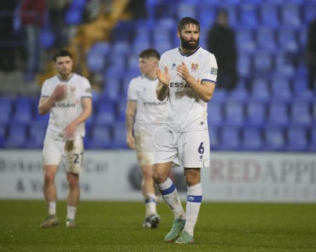 Photo for Jordan Turnbull of Tranmere Rovers salutes the fans after the Sky Bet League 2 match Tranmere Rovers vs Morecambe at Prenton Park, Birkenhead, United Kingdom, 13th February 202 - Royalty Free Image