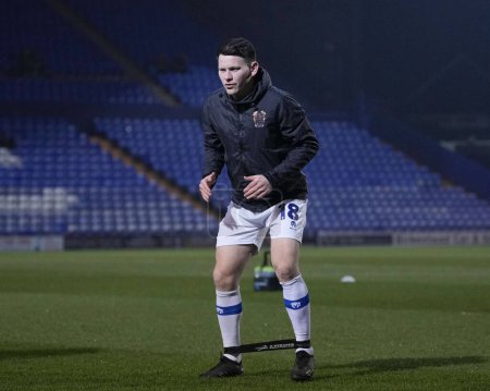 Photo for Connor Jennings of Tranmere Rovers warms up before the Sky Bet League 2 match Tranmere Rovers vs Morecambe at Prenton Park, Birkenhead, United Kingdom, 13th February 202 - Royalty Free Image