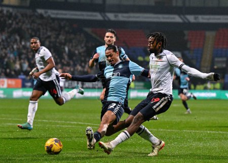 Photo for Paris Maghoma of Bolton Wanderers shoots on goal, during the Sky Bet League 1 match Bolton Wanderers vs Wycombe Wanderers at Toughsheet Community Stadium, Bolton, United Kingdom, 13th February 202 - Royalty Free Image