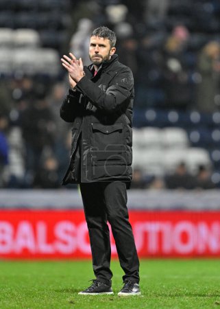 Photo for Michael Carrick manager of Middlesbrough claps fans at full time, during the Sky Bet Championship match Preston North End vs Middlesbrough at Deepdale, Preston, United Kingdom, 14th February 202 - Royalty Free Image